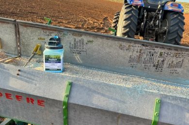 Tractor and grain drill in the field